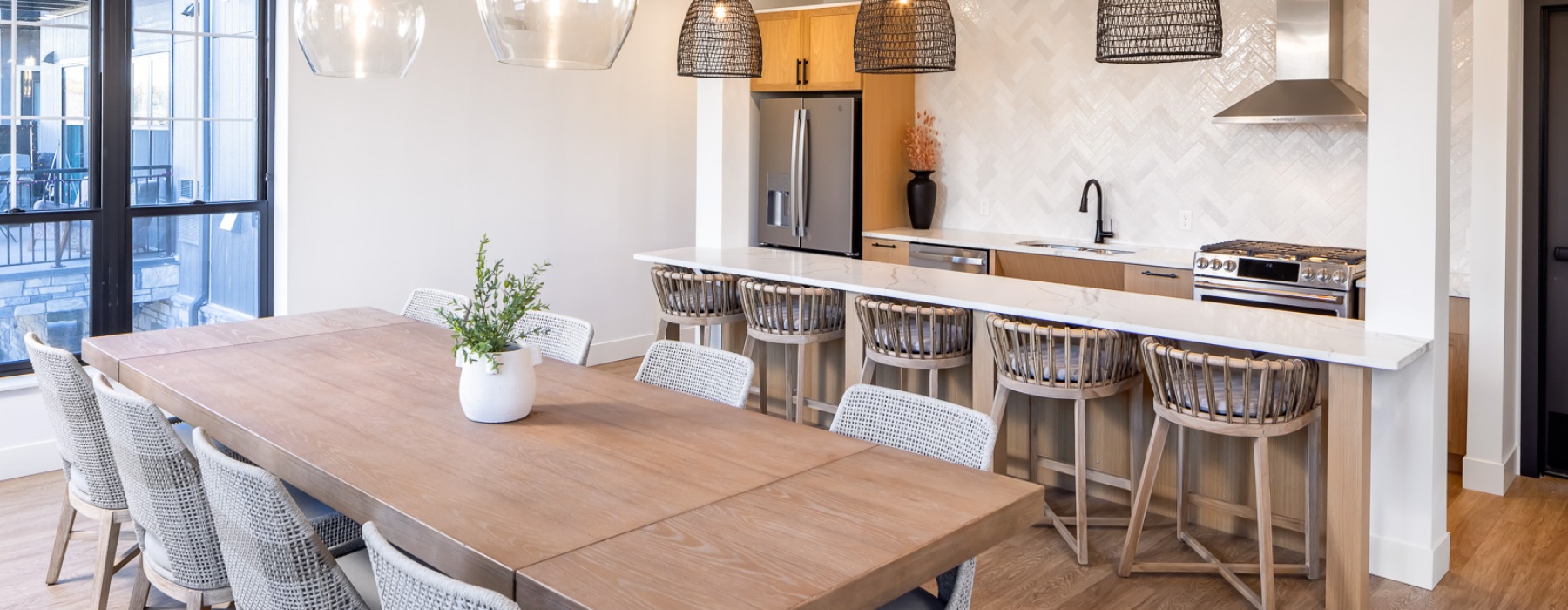 Entertaining kitchen with harvest-style seating