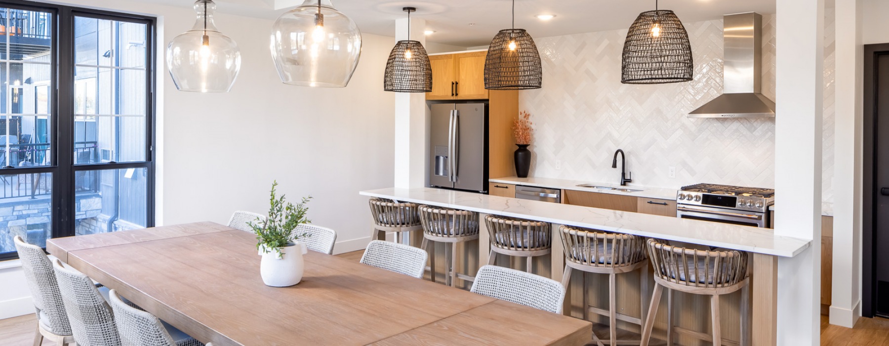 Entertaining kitchen with harvest-style seating