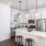 spacious kitchen with island and stainless steel appliances